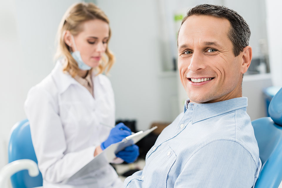 man visiting the dentist