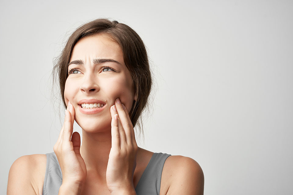 woman with mouth pain